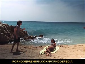 PORNDOE PEDIA handsome dark-hued babe beach bang-out tutorial